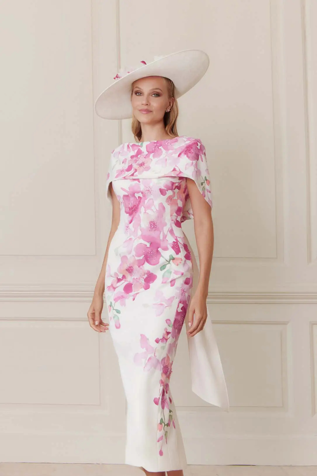 Woman in pink and white floral dress cropped in Ballyclare