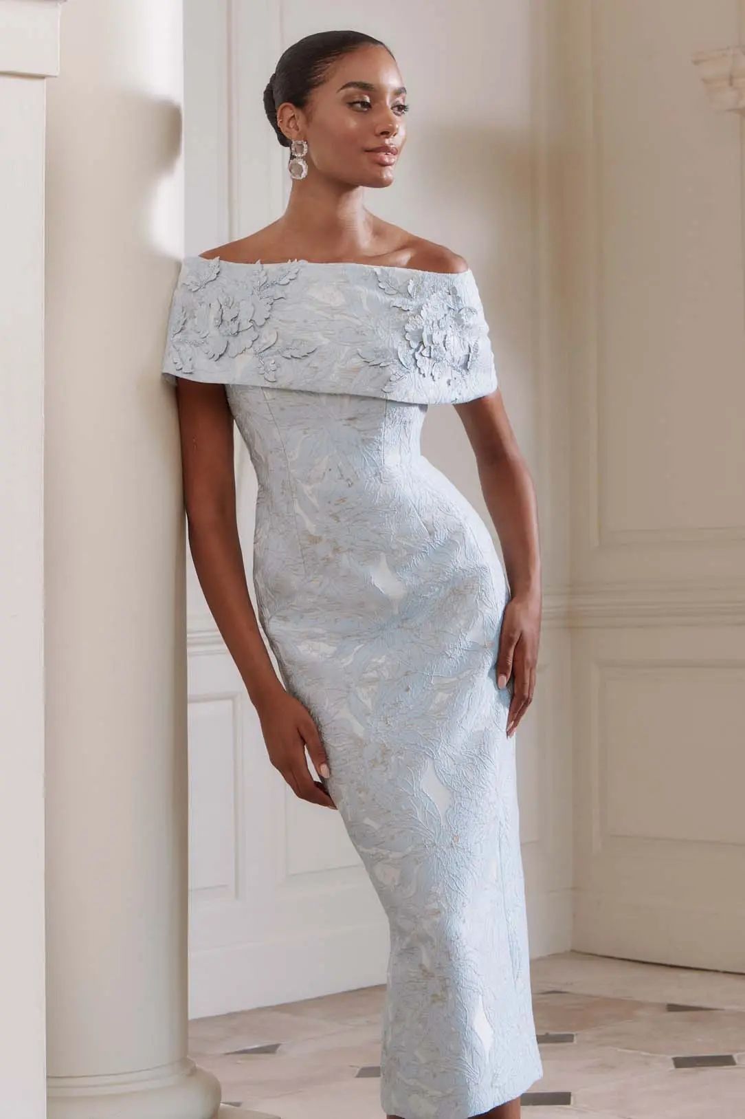 Black girl in baby blue dress cropped in Ballyclare